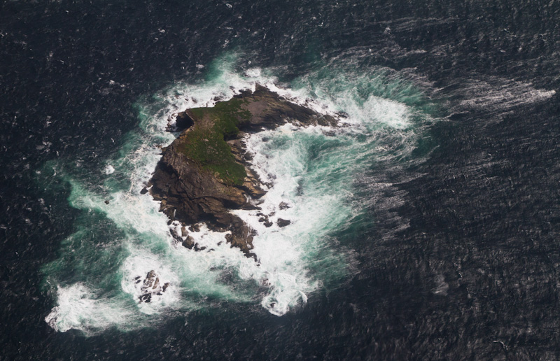 Waves Breaking Around Small Island