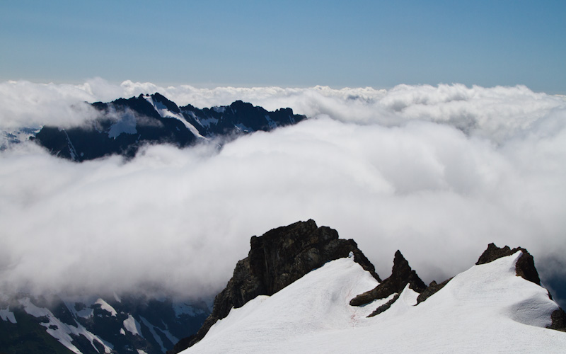 Johannesberg Mountain Jutting Out Of Clouds