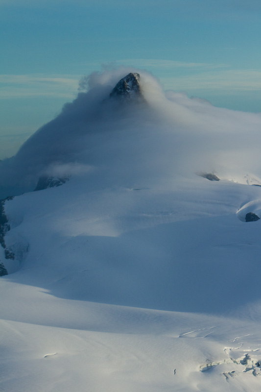 Mount Shuksan Enshrouded In Clouds