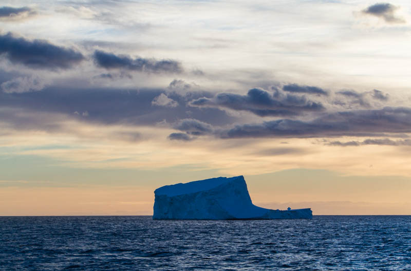Iceberg And Clouds