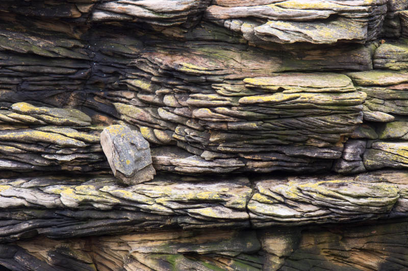 Rocks On Cliff Face